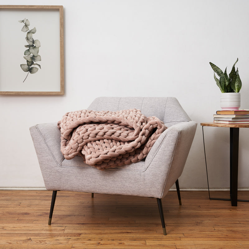 rose quartz velvet napper on couch